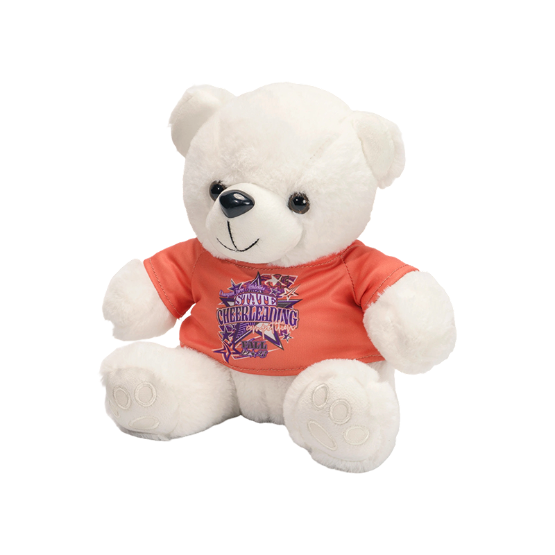 Yndigt bjørneplys legetøj iført en T-shirt Yndigt bjørneplys legetøj iført en T-shirt
